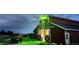Well-lit barn with open doors and a truck parked outside, showcasing a functional and inviting space at 2470 Driftwood, Elizabeth, CO 80107