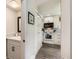 Modern kitchen with white cabinets, stainless steel appliances, and updated countertops at 15976 E Radcliff Pl # A, Aurora, CO 80015