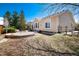 Spacious backyard featuring a hot tub, a wooden privacy fence and a potential garden area at 11302 Mesa Verde Pl, Parker, CO 80138