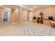 Spacious finished basement with built-in shelving, neutral colors and a plush rug for cozy living at 11302 Mesa Verde Pl, Parker, CO 80138