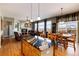 Inviting living room with a black granite kitchen island and a cozy seating area with fireplace at 11302 Mesa Verde Pl, Parker, CO 80138