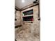 Beautiful shower with tiled walls, recessed shelves, and a sleek shower head at 11302 Mesa Verde Pl, Parker, CO 80138