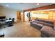 Basement featuring spiral staircase, media area, and workstation at 8 Sioux Trl, Evergreen, CO 80439
