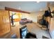 Basement featuring fireplace, spiral staircase, and media area at 8 Sioux Trl, Evergreen, CO 80439