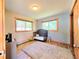 Bedroom featuring wood floors, natural light, and a closet at 8 Sioux Trl, Evergreen, CO 80439