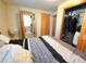 Bedroom featuring a door to the laundry room and a closet at 8 Sioux Trl, Evergreen, CO 80439