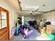 Cluttered garage features items scattered throughout at 8 Sioux Trl, Evergreen, CO 80439