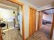 This laundry room is spacious and leads to other areas at 8 Sioux Trl, Evergreen, CO 80439