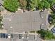 Aerial top-down shot shows the community's rooftops, layout, and parking facilities at 5300 E Cherry Creek South Drive # 918, Denver, CO 80246