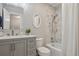 A modern bathroom featuring a vanity, toilet, bathtub, and shower with rainfall shower head at 5300 E Cherry Creek South Drive # 918, Denver, CO 80246