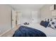 Cozy bedroom with neutral colors, a comfortable bed, and ample closet space at 5300 E Cherry Creek South Drive # 918, Denver, CO 80246