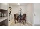 Dining room featuring wood floors, contemporary decor, and white walls at 5300 E Cherry Creek South Drive # 918, Denver, CO 80246