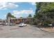 A view of the townhome community with parking, trees, and outdoor staircases at 5300 E Cherry Creek South Drive # 918, Denver, CO 80246