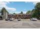 Charming exterior view of townhomes featuring private staircases and ample parking at 5300 E Cherry Creek South Drive # 918, Denver, CO 80246