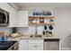 Modern kitchen featuring stainless steel appliances, granite countertops, and stylish backsplash at 5300 E Cherry Creek South Drive # 918, Denver, CO 80246