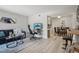 Open living room and dining space with wood floors and contemporary decor at 5300 E Cherry Creek South Drive # 918, Denver, CO 80246