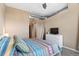 Comfortable bedroom with closet, TV, and industrial ceiling at 7700 E 29 Ave # 304, Denver, CO 80238