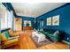 Beautiful living room featuring hardwood floors, wood furniture, and stylish decor at 2240 S Clermont St, Denver, CO 80222