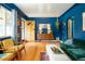 Cozy living room with hardwood floors, comfortable seating, and vintage furniture at 2240 S Clermont St, Denver, CO 80222