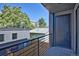 Private balcony with metal railing and city view at 1825 Grove St, Denver, CO 80204