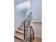 Modern staircase with light wood steps and metal railing at 1825 Grove St, Denver, CO 80204