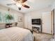 Relaxing bedroom featuring shutters and neutral tones at 5525 S Lowell Blvd, Littleton, CO 80123