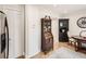 Dining area includes a built-in hutch, closet, and hardwood floors at 5525 S Lowell Blvd, Littleton, CO 80123