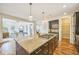 Stylish kitchen with granite island, open floor plan, and seamless access to the living area. Perfect for entertaining at 3366 Willow St, Denver, CO 80238