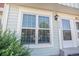 Charming townhome with updated windows, complemented by lush greenery for a welcoming curb appeal at 6774 S Independence St, Littleton, CO 80128
