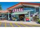 Facade of the Ideal Market, featuring stacked watermelons and produce for sale under the awning at 827 Maxwell Ave # H, Boulder, CO 80304