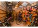 Storage room filled with bicycles hanging from the ceiling and stacked against the walls at 827 Maxwell Ave # H, Boulder, CO 80304