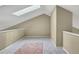 Bright, airy loft featuring neutral tones, skylights, and ample natural light for a versatile living area at 1099 S Walden Way # 205, Aurora, CO 80017