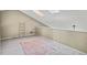 Bright loft space featuring skylights, neutral carpet, and a cozy, inviting atmosphere at 1099 S Walden Way # 205, Aurora, CO 80017
