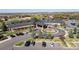 Beautiful clubhouse features an inviting entrance, well-manicured landscaping, and ample parking spaces at 8101 S Quatar Cir, Aurora, CO 80016