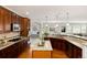 Bright kitchen features wooden cabinets, granite countertops, and stainless steel appliances at 8101 S Quatar Cir, Aurora, CO 80016
