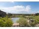 Scenic view of the covered outdoor pool overlooking the golf course and community at 8101 S Quatar Cir, Aurora, CO 80016