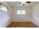 Well-lit bedroom with hardwood floors and neutral paint, creating a serene space at 5810 S Greenwood St, Littleton, CO 80120