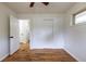 Bedroom with hardwood floors, a ceiling fan and a closet with sliding doors at 5810 S Greenwood St, Littleton, CO 80120