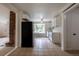Bright kitchen with tile floors, white cabinets, and a view of the backyard from the bay window at 5810 S Greenwood St, Littleton, CO 80120
