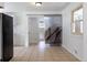 Bright kitchen features tile flooring, white walls, and a unique sliding door with a stone design at 5810 S Greenwood St, Littleton, CO 80120