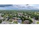 A wide shot of a neighborhood filled with lush green trees at 6888 Howell St, Arvada, CO 80004