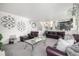 Spacious living room with comfortable leather furniture and stylish decor at 6888 Howell St, Arvada, CO 80004