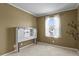 Bedroom features window and decorative shelving at 5779 Ceylon St, Denver, CO 80249