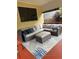 Covered outdoor living space with rug and patio furniture at 10525 Hobbit Ln, Westminster, CO 80031