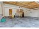 Spacious garage with storage shelves and ample room for vehicles and projects at 10525 Hobbit Ln, Westminster, CO 80031