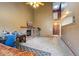 Spacious living room with vaulted ceilings and brick fireplace at 10525 Hobbit Ln, Westminster, CO 80031