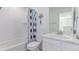 Well-lit bathroom featuring tub, toilet, and vanity at 17825 Gallup St, Broomfield, CO 80023