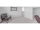 Cozy bedroom featuring a comfortable chair and ample natural light at 17825 Gallup St, Broomfield, CO 80023