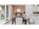 Cozy dining area featuring modern decor and seamless access to the outdoor living space at 17825 Gallup St, Broomfield, CO 80023