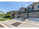 Charming home exterior with a two-car garage and well-maintained landscaping in a lovely community at 17825 Gallup St, Broomfield, CO 80023